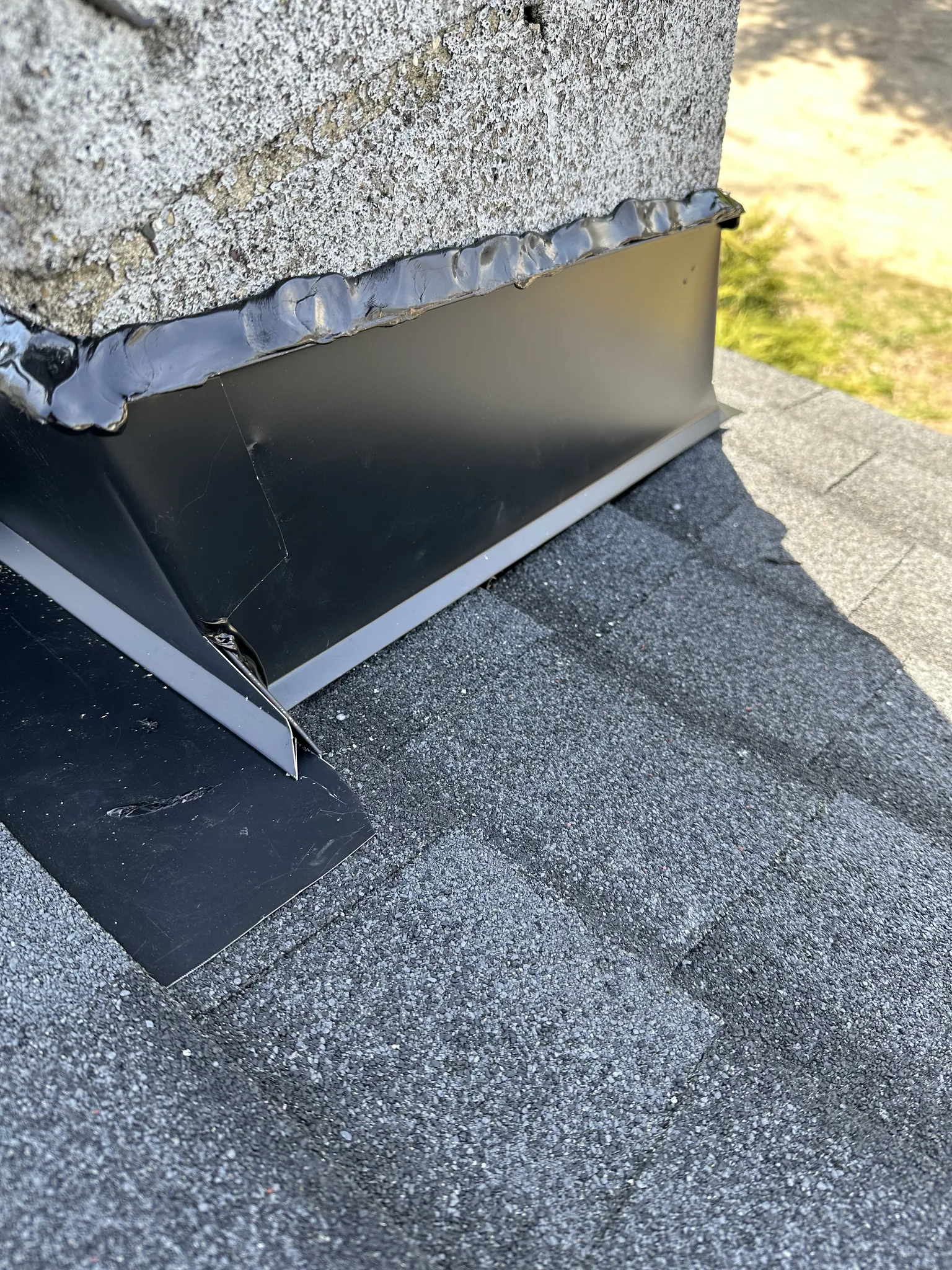 Chimney flashing detail on Platinum Roofing residential project
