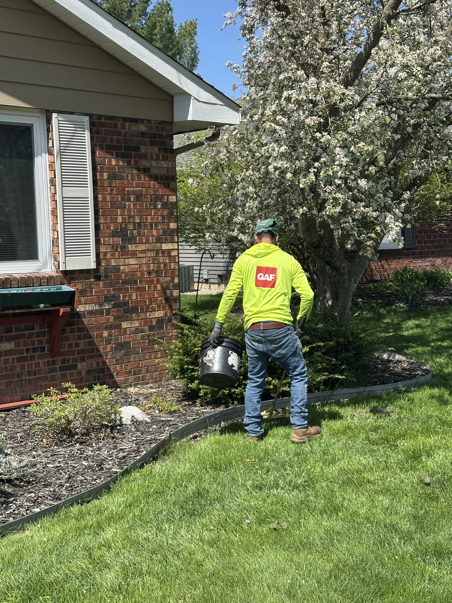 A GAF-certified Platinum Roofing crew on a West Michigan home — a credentialed, locally based team, the opposite of the out-of-town storm-chasers who knock doors after a hail storm