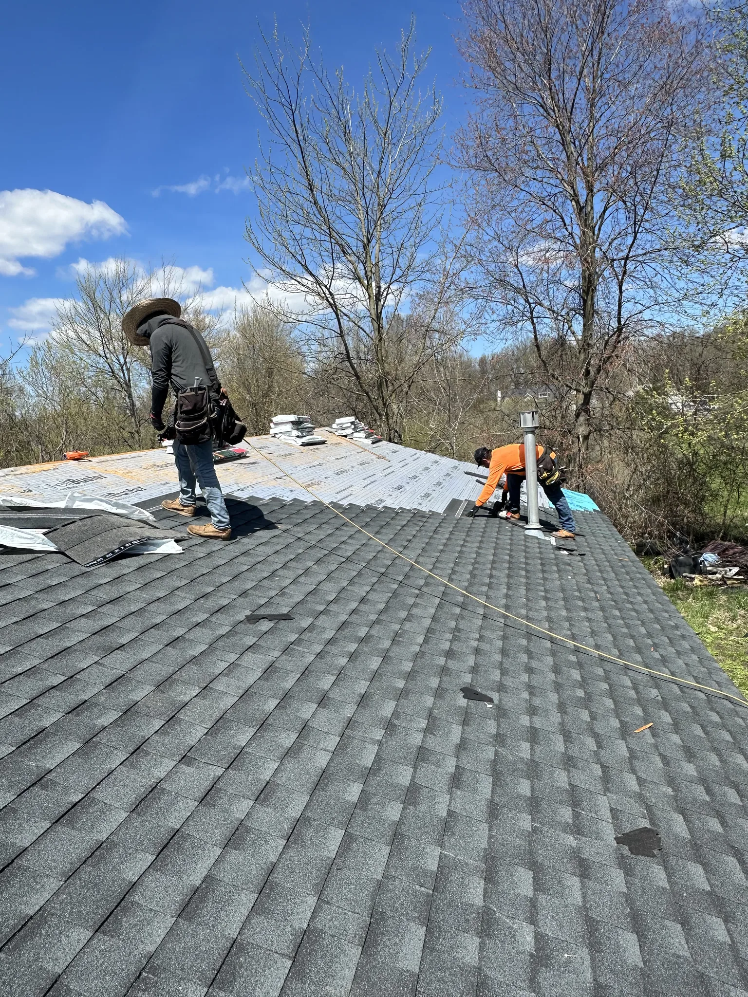 Residential roof tear-off in progress, West Michigan