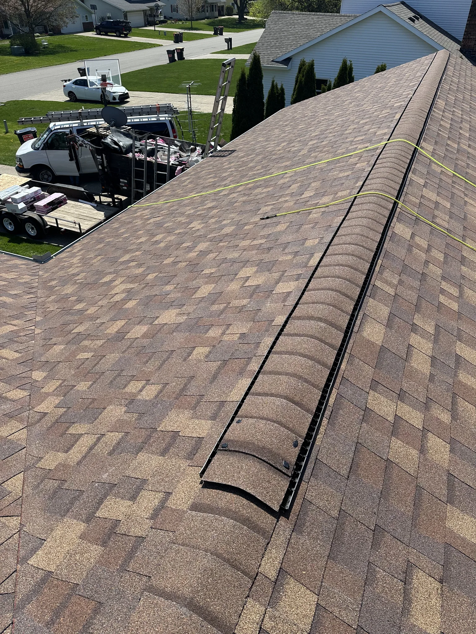 Finished ridge with continuous ridge vent on a Platinum Roofing job